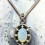 Time & Lustre 2.75ct Coober Pedy crystal opal pendant necklace in sterling silver with lab grown diamond accents.