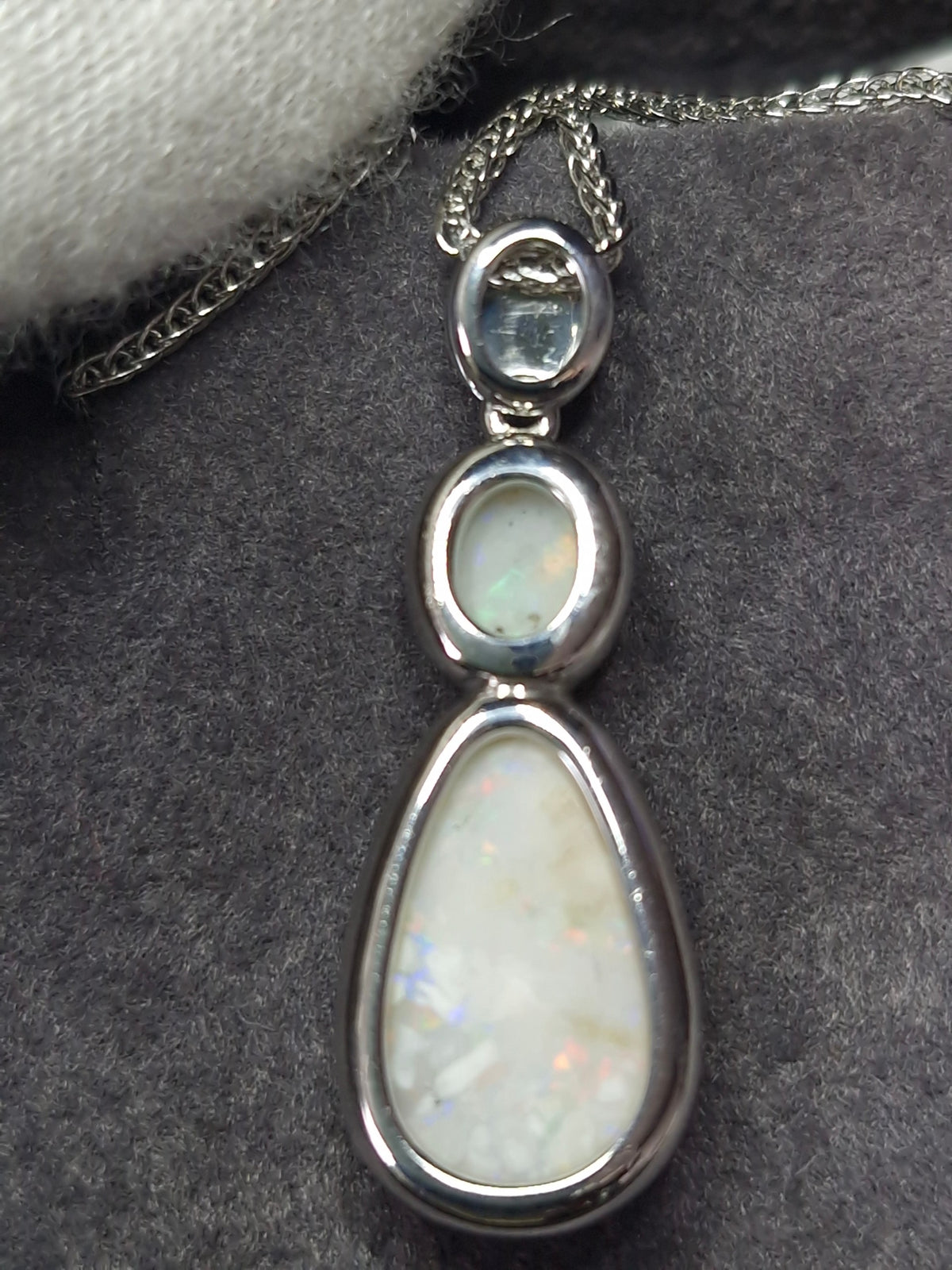 Time & Lustre double drop opal pendant necklace featuring iridescent white opals in a polished silver-tone setting.