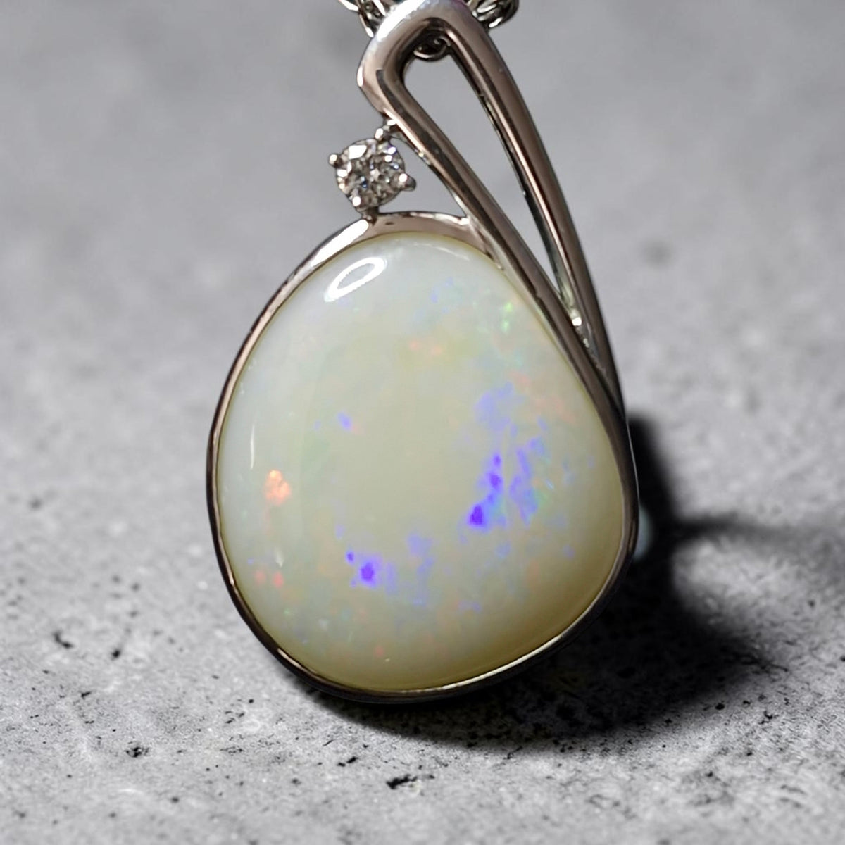 Time & Lustre teardrop Coober Pedy opal pendant in sterling silver with a sparkling lab diamond accent