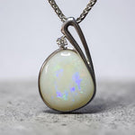 Time & Lustre free-form Coober Pedy opal pendant in sterling silver with a round-cut lab diamond accent.