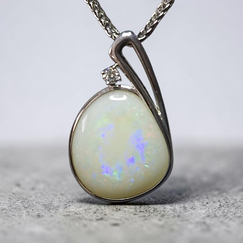 Time & Lustre free-form Coober Pedy opal pendant in sterling silver with a round-cut lab diamond accent.