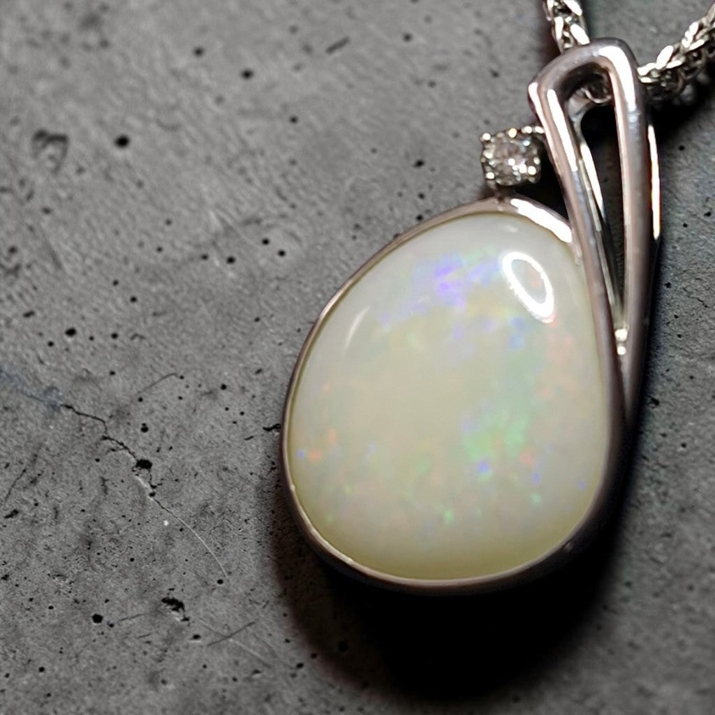 Time & Lustre teardrop Coober Pedy opal pendant in sterling silver with a sparkling lab diamond accent