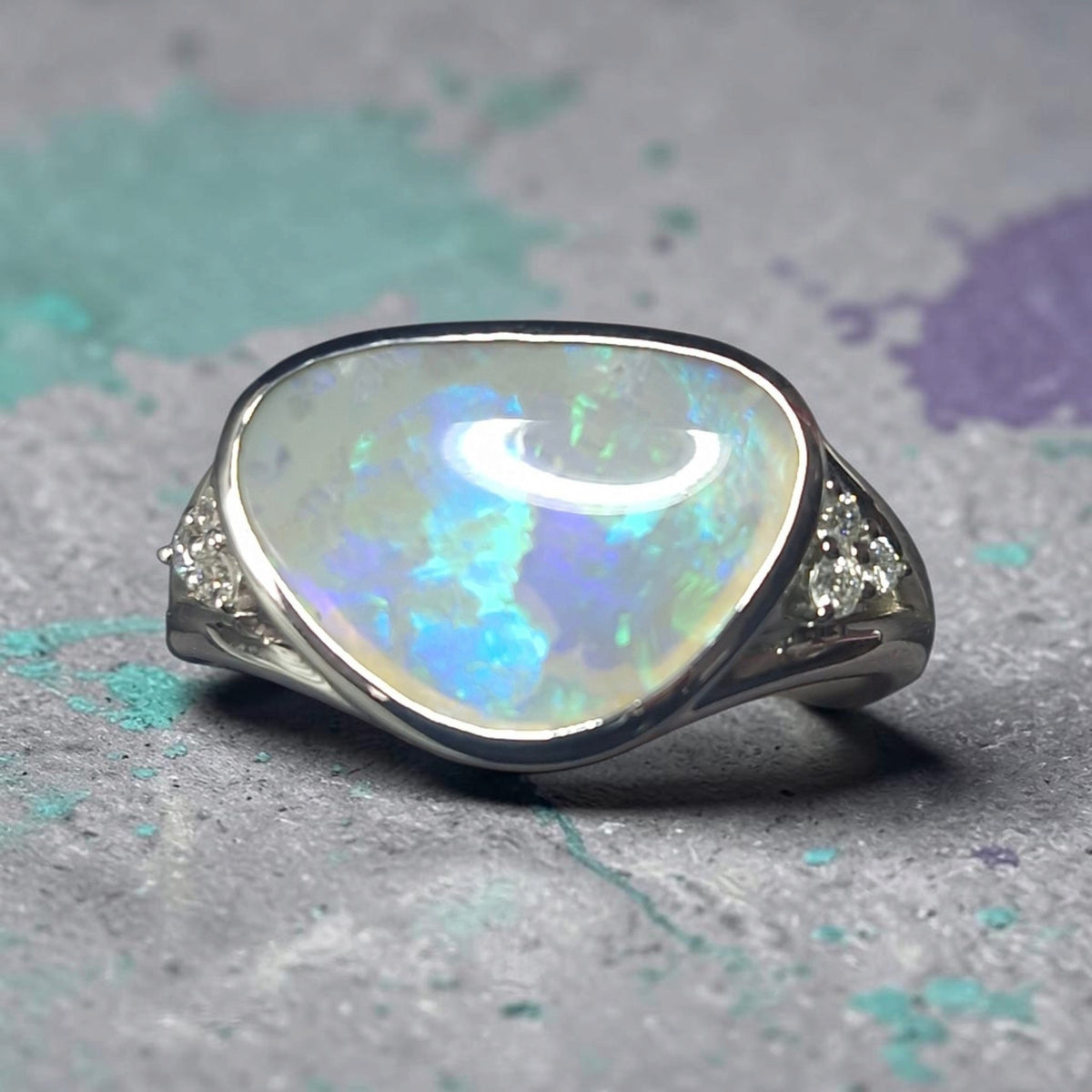 Time & Lustre 2.50ct Lightning Ridge crystal opal ring in sterling silver with lab grown diamond accents.