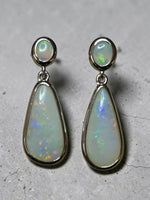 Time & Lustre elegant drop earrings featuring teardrop Australian opals set in polished sterling silver