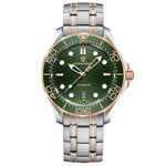 Time & Lustre Pagani Design 1685 automatic dive watch with a green dial, gold accents, and stainless steel bracelet.