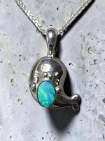 Time & Lustre sterling silver seal pendant featuring a vibrant blue and green opal on a matching silver chain.