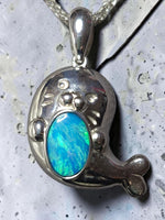 Time & Lustre sterling silver seal pendant featuring a vibrant blue and green iridescent opal on a silver chain