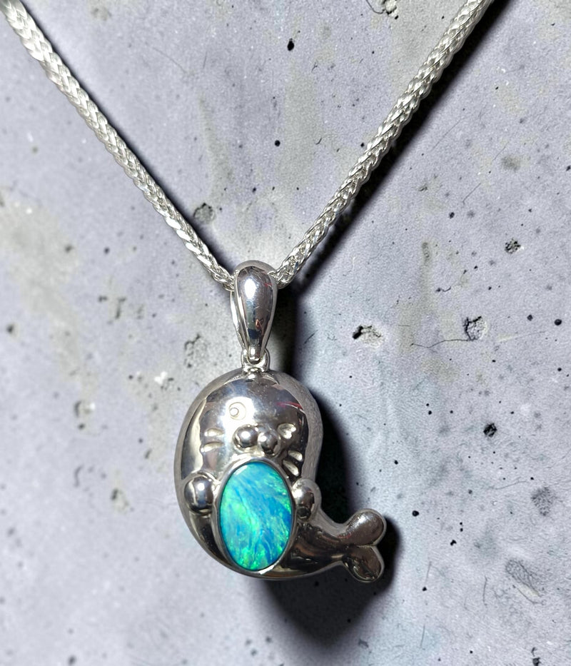 Time & Lustre sterling silver seal pendant featuring a vibrant blue and green opal inlay on a matching silver chain.