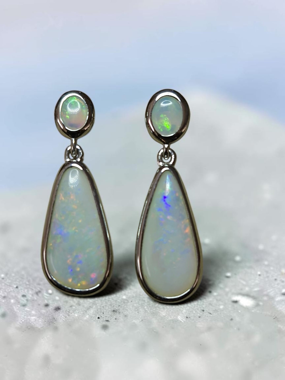 Time & Lustre teardrop opal drop earrings in polished sterling silver with a two-tier oval and teardrop design.